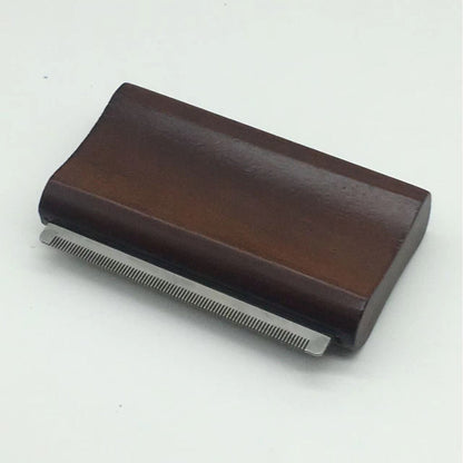 pet hair remover for horses with a sturdy beech wood handle for comfortable grooming sessions.